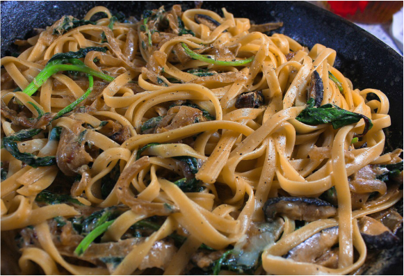 Creamy Fettuccine with Caramelized Onions, Mushrooms, and Kale
