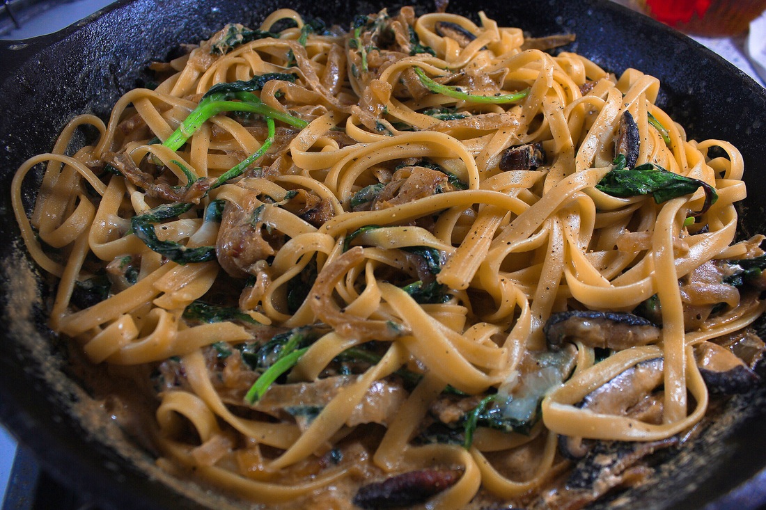 Creamy Fettuccine with Caramelized Onions, Mushrooms, and Kale